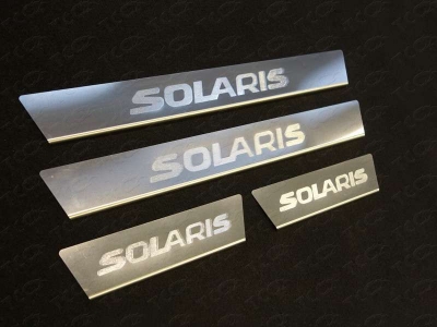 Накладки на пороги шлифованный лист с логотипом ТСС для Hyundai Solaris 2014-2017